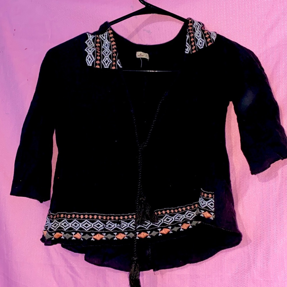 2 crop tops and a long sleeve shirt